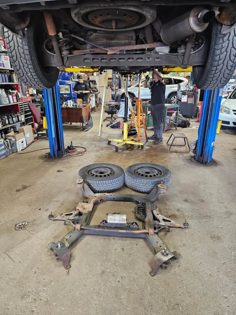 Suspension and undercarriage service on vehicle lift